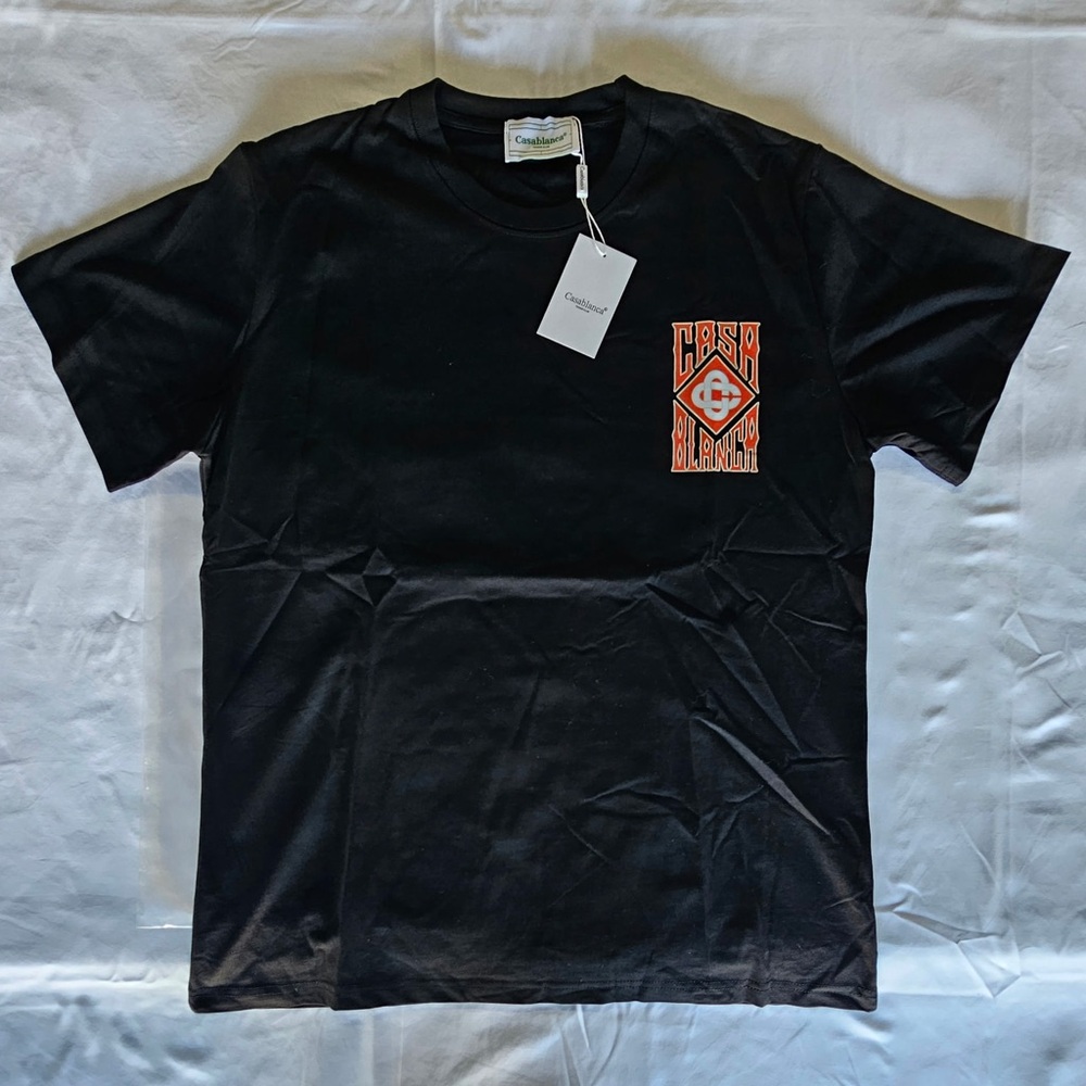 Casablanca Black Short Sleeve Tee with Orange Chest Graphic Logo!